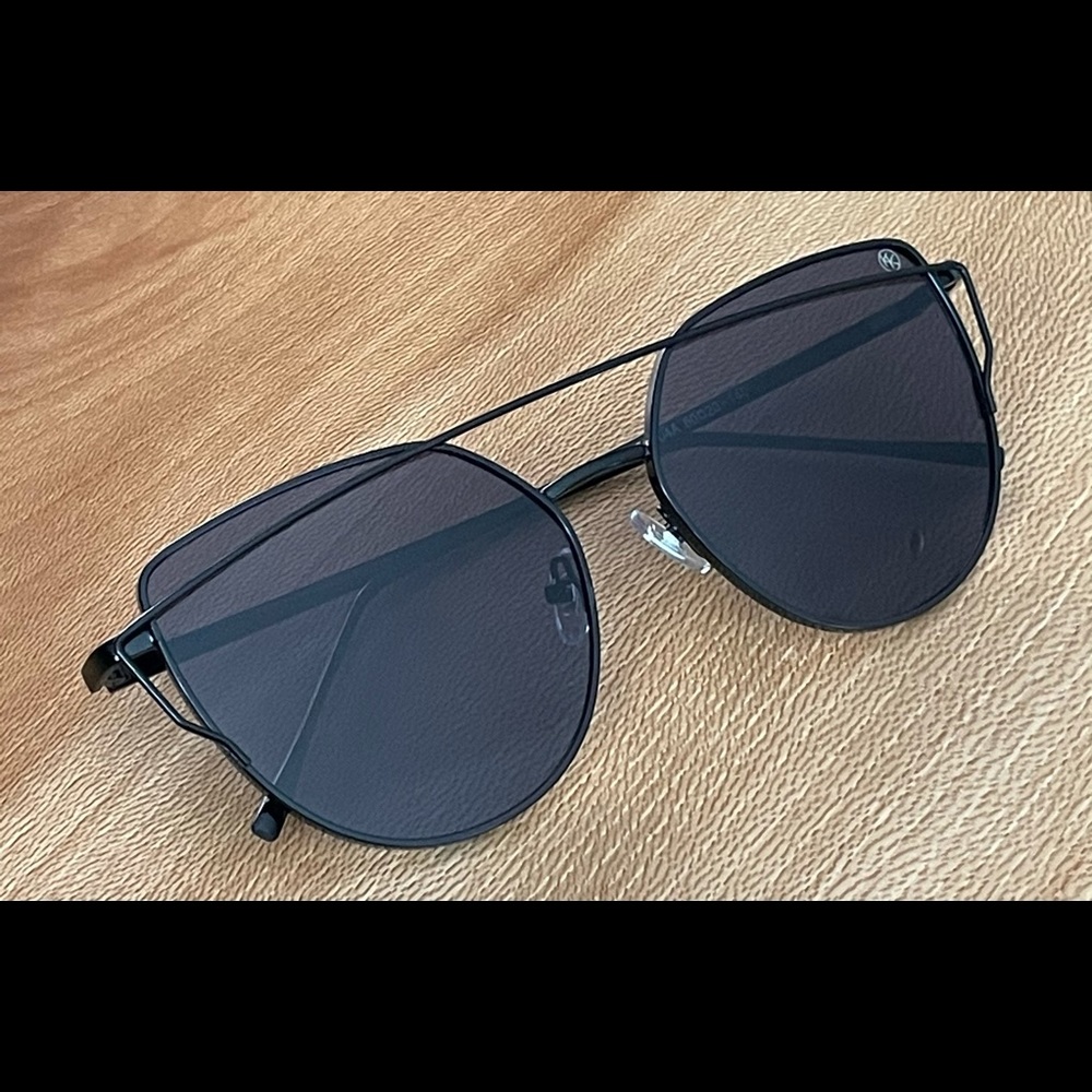 Black on black mirrored sunglasses